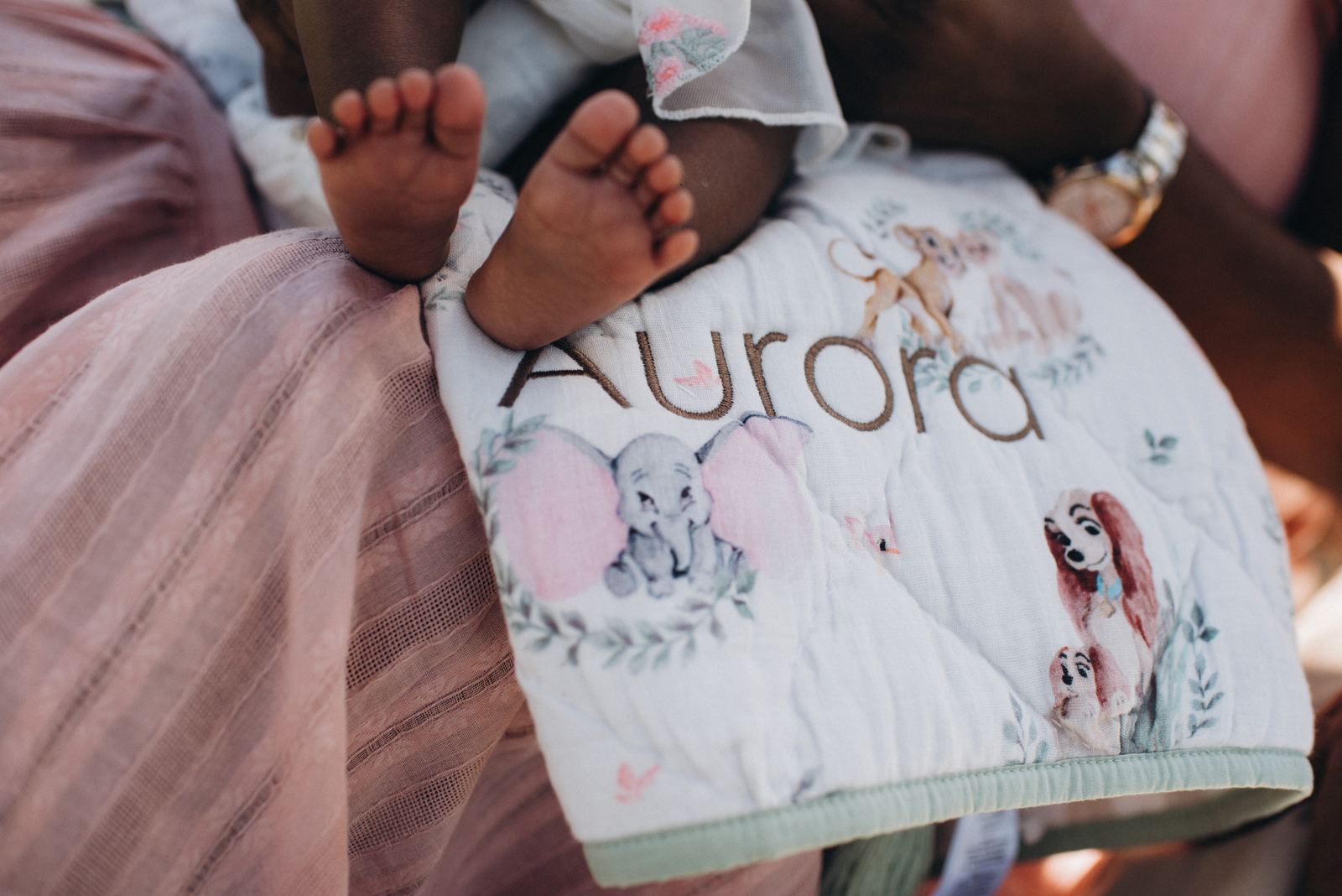 Aurora's personalized blanket and tiny feet
