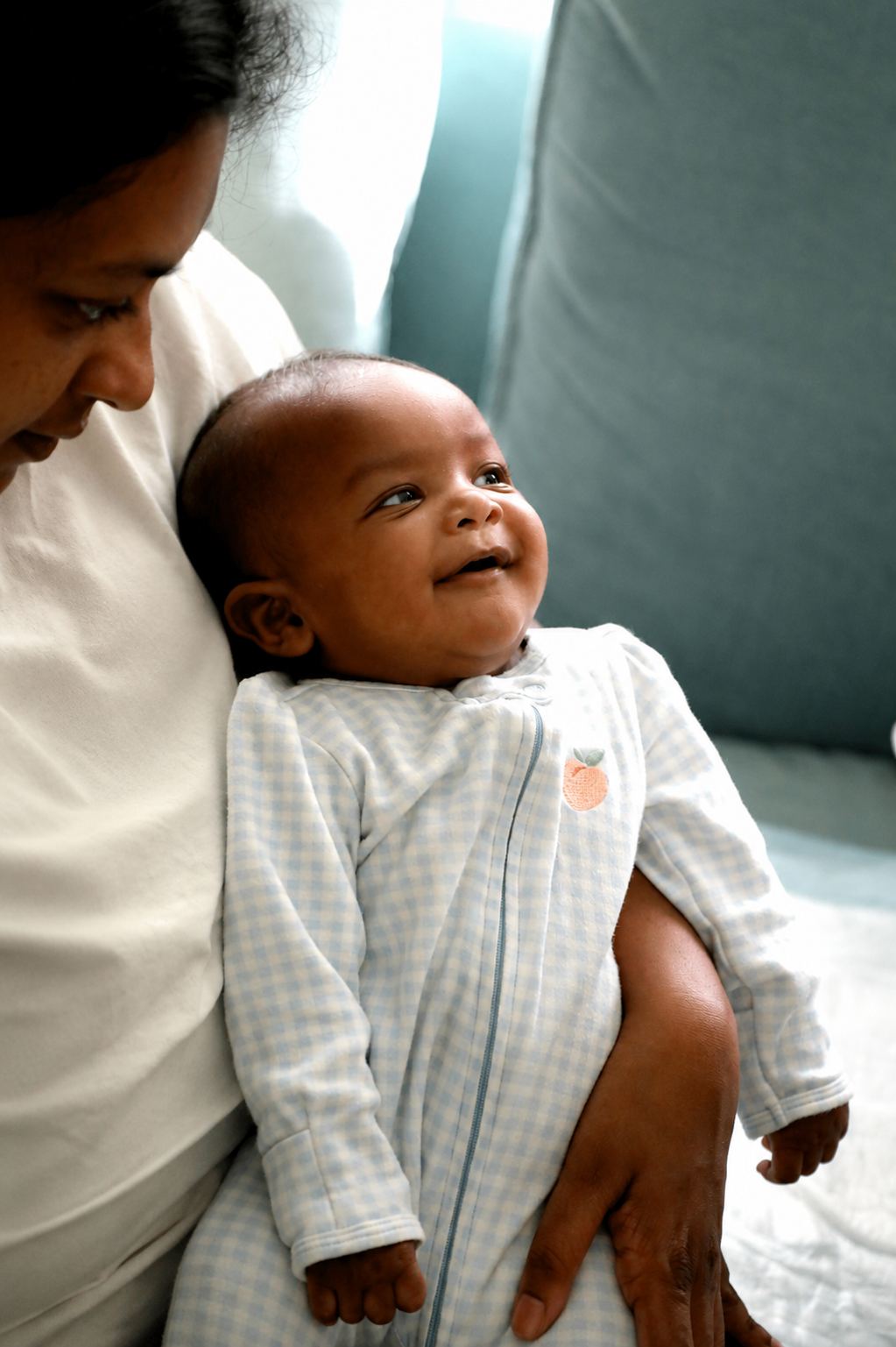 Aurora smiling with family